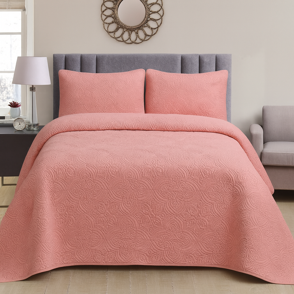 Colcha elegante con diseño bordado.