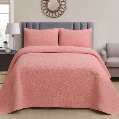 Colcha elegante con diseño bordado.